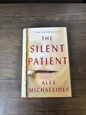 The Silent Patient by Alex Michaelides Hardcover Book - Cream with Red Text